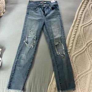 Levi’s jeans 724 high rise straight.